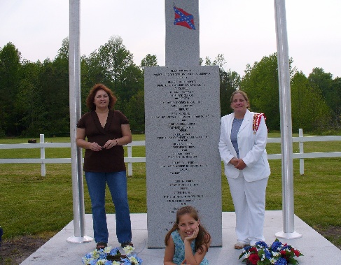 UDC Caleb Ross chapter president Joyce Zoch and member Laura Wilson stand beside the Delaware Confederate Monument after the unveiling event on May 12th, 2007.