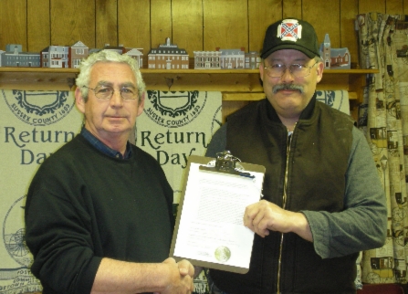 Georgetown Historical Society President, Wes Jones, with Delaware Grays Camp Commander, John Zoch, displaying the recently signed agreement between the two organizations for the installation of the first ever Delaware Confederate monument.